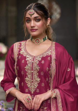 Graceful front pose of model in festive embroidered kurta set.
